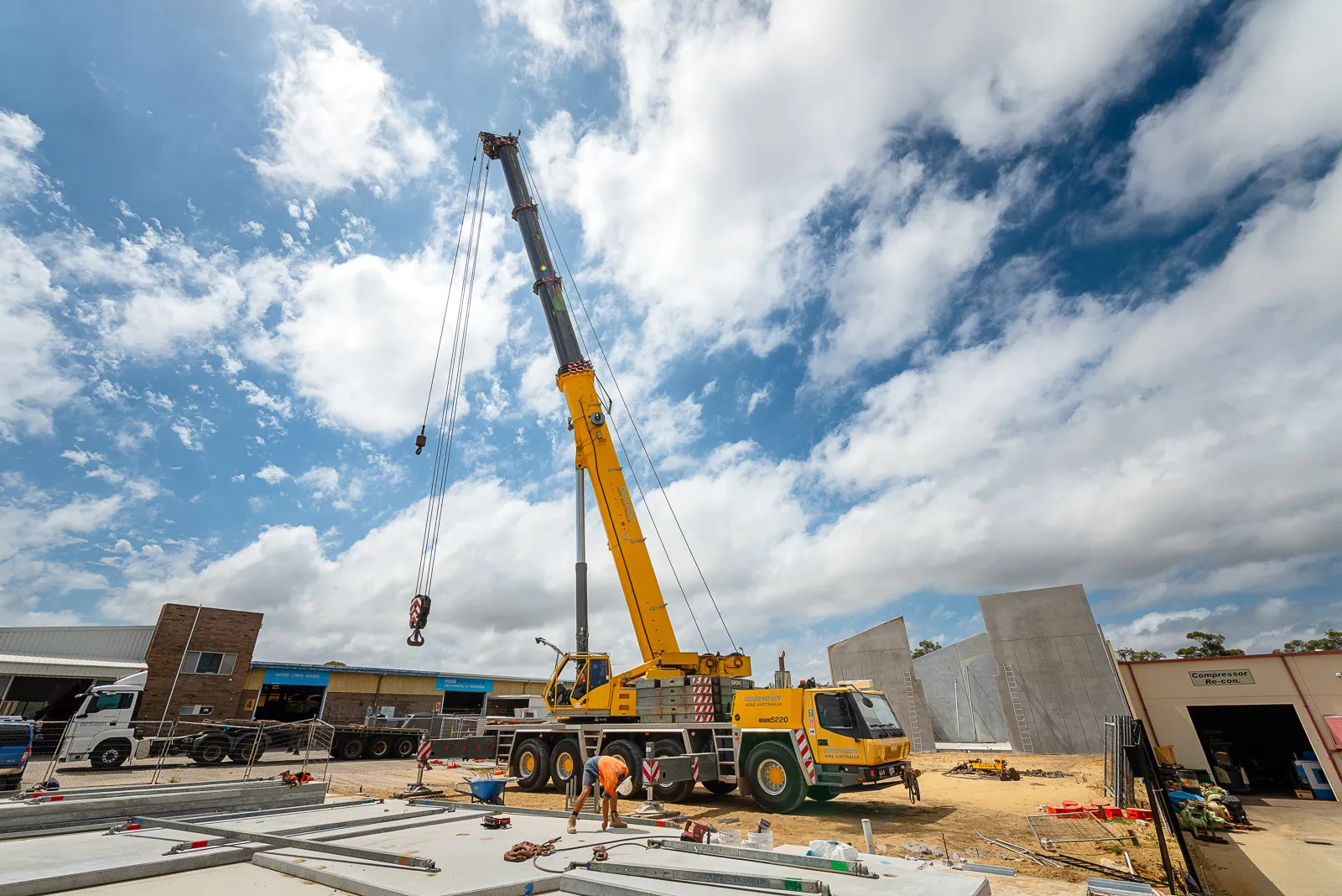JD Rigging & Construction, Equipment Hire Australia  crane on a building project erecting concrete panels and steel structures 
