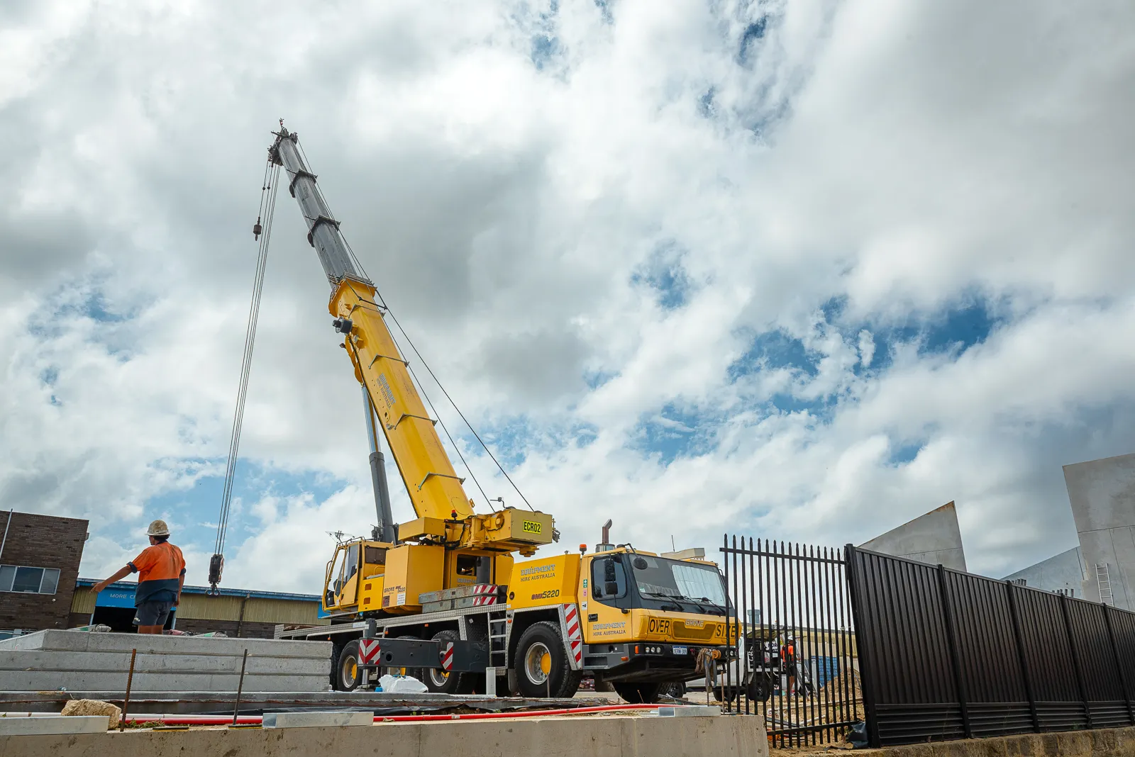 JD Rigging & Construction, Equipment Hire Australia crane building a concrete structure