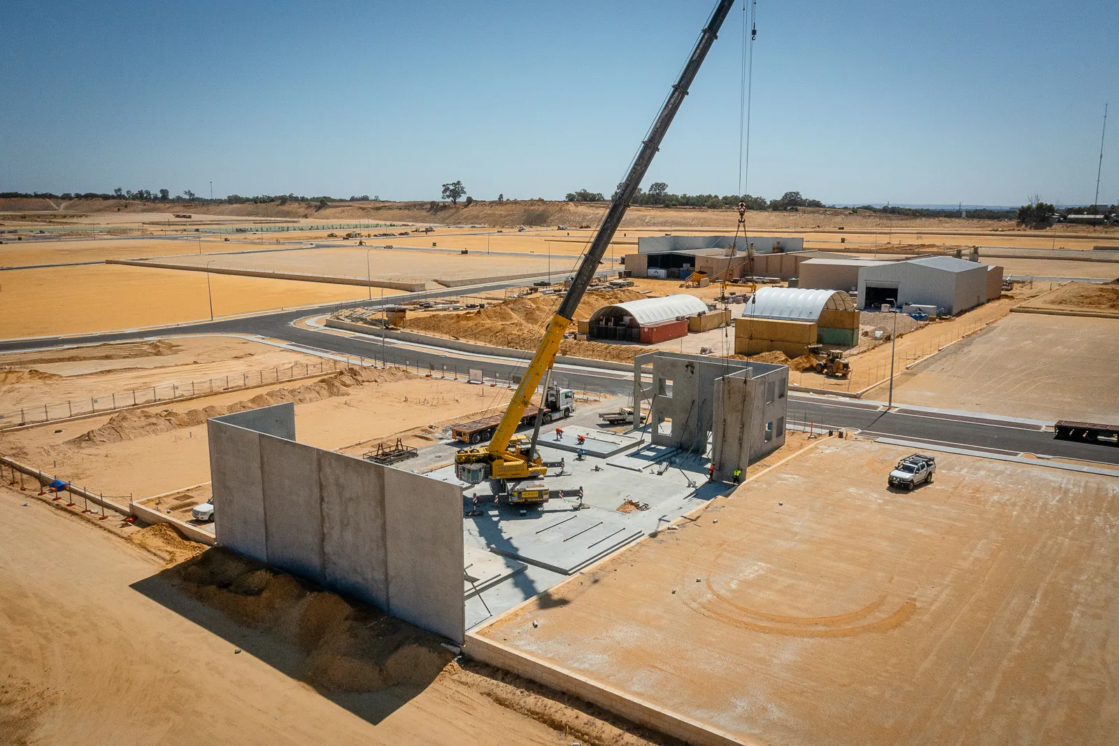 aerial view of JD Rigging & Construction, Equipment Hire Australia crane building a concrete panel structure