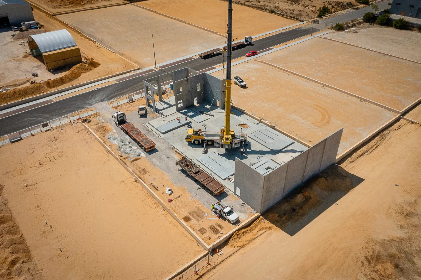 aerial view of JD Rigging & Construction, Equipment Hire Australia crane building a concrete panel structure